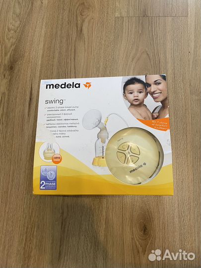 Молокоотсос medela электрический
