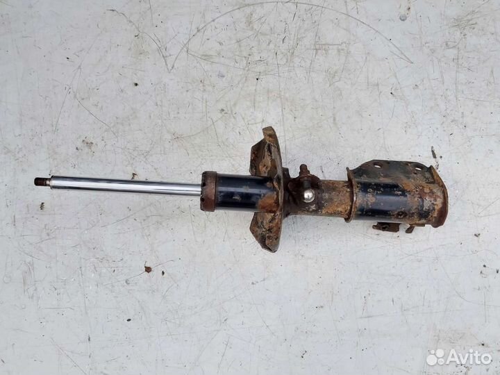 Стойка амортизатора передняя правая Mazda 323 BJ