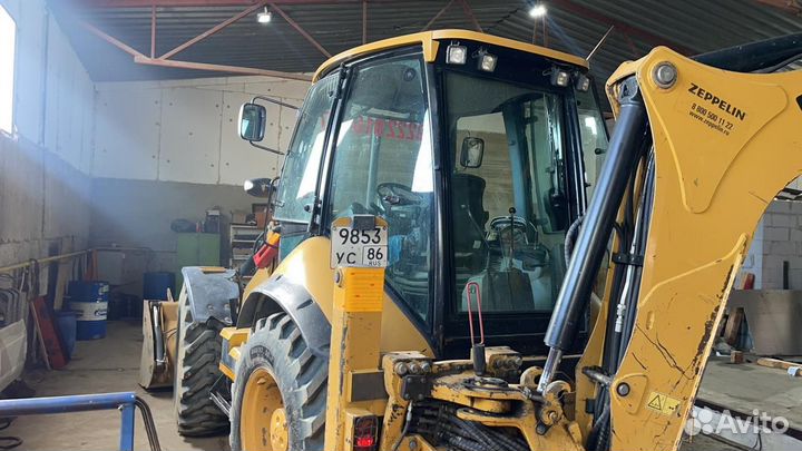 Экскаватор погрузчик