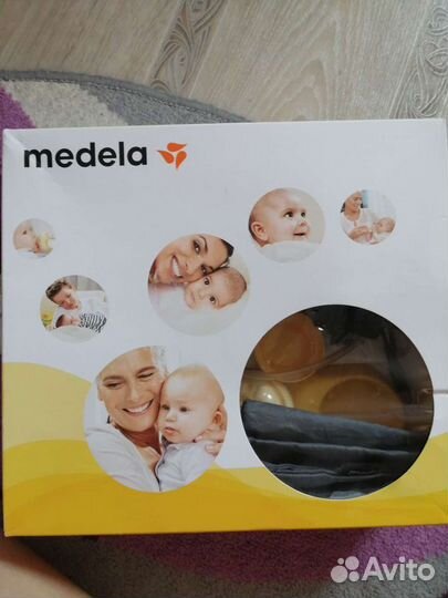 Молокоотсос medela