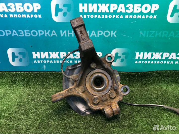 Кулак поворотный передний левый Nissan Tiida C11