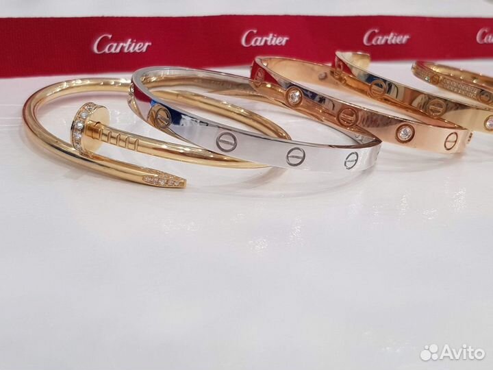 Золотые браслеты Cartier Love и Just un clou с бри