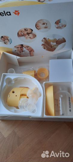 Молокоотсос medela электрический