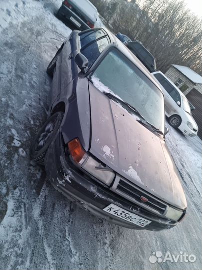 Mazda familia разбор