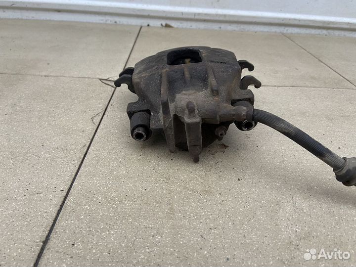 Тормозной суппорт передний правый Ford Focus 1