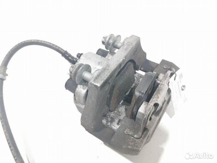 Суппорт тормозной задний левый BMW X5 F15 2018