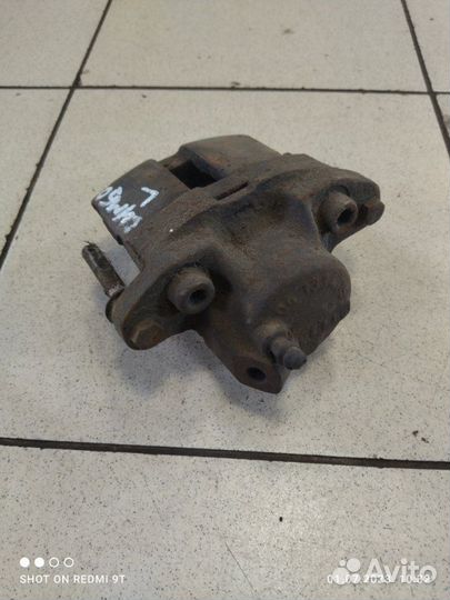 Суппорт тормозной передний левый Renault Symbol