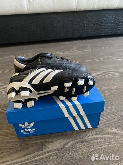 Футбольные бутсы adidas