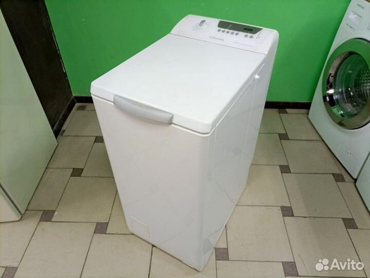 Машина с вертикальной загрузкой бу. Electrolux