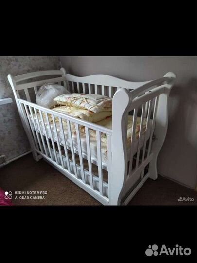 Детская кровать с маятником и ящиком