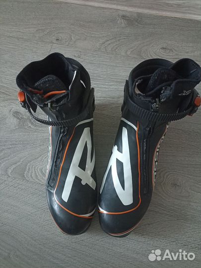 Лыжные ботинки коньковые rossignol