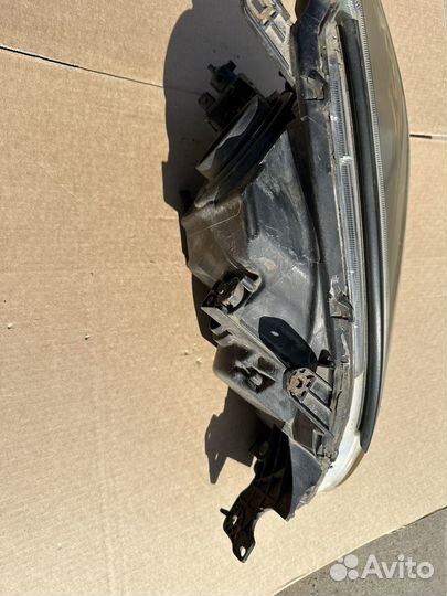 Фара левая Mitsubishi Lancer 9