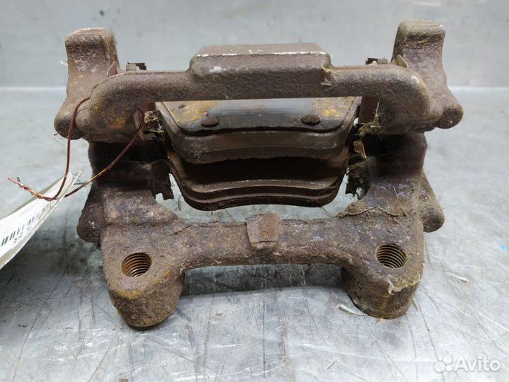 Скоба суппорта заднего левого Skoda Octavia (A5