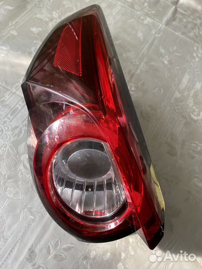 Фонарь задний mazda 9сx левый