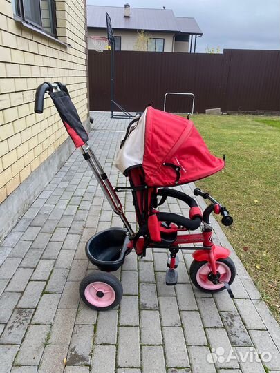 Трехколесный велосипед с ручкой