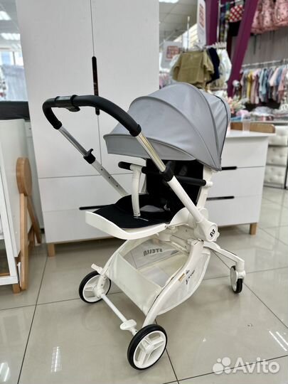 Прогулочная коляска новая