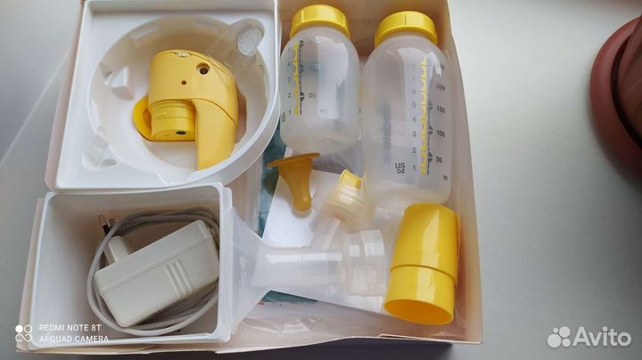 Молокоотсос medela электрический