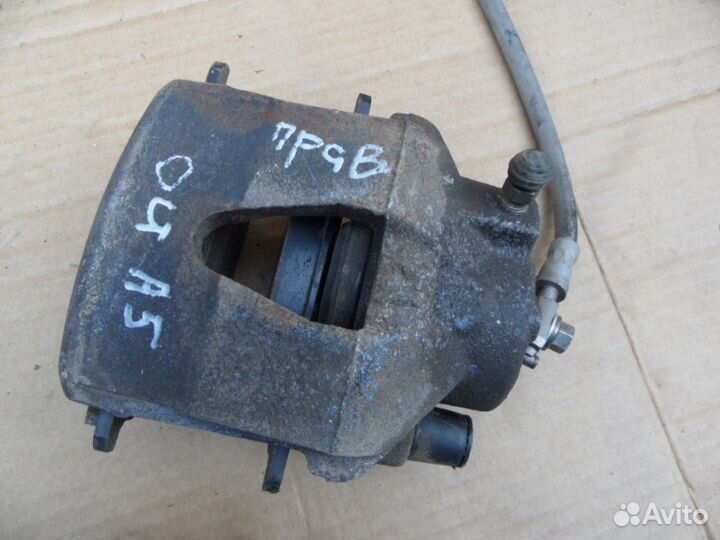 Суппорт тормозной передний Шкода Октавия А5