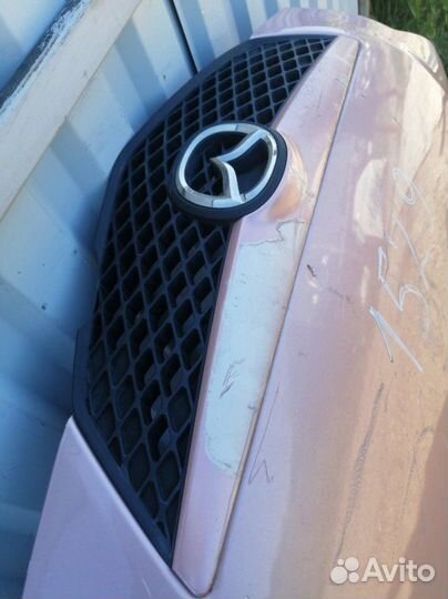 Капот Mazda Demio DY