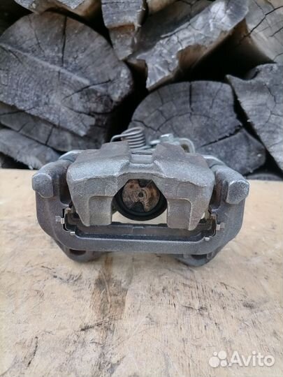 Задний тормозной суппорт Мазда 6 GG