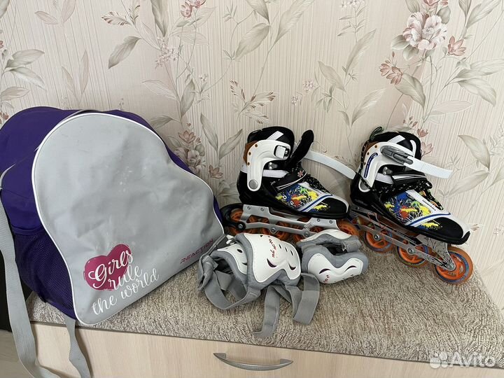 Роликовые коньки