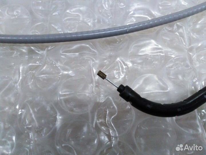 Трос привода корректора фар Renault Logan 2004