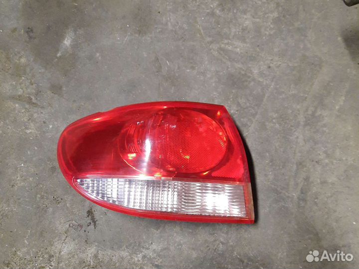 Задний левый фонарь mazda millenia