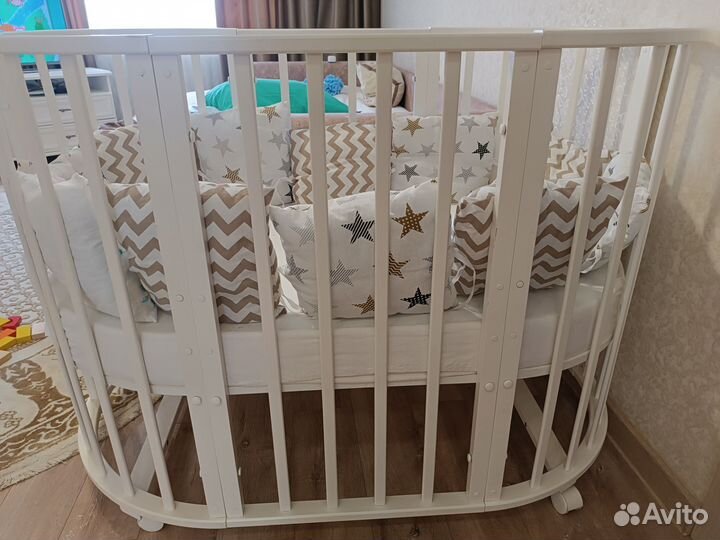 Детская кроватка трансформер с маятником