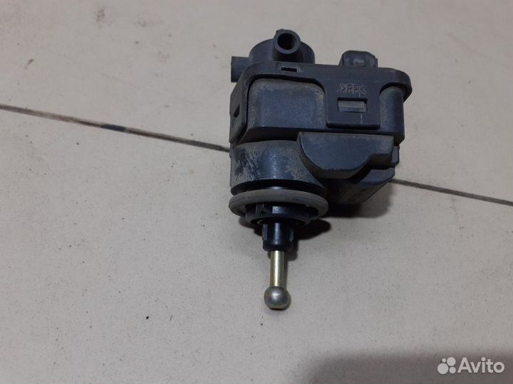 Моторчик корректора фары Mitsubishi Outlander