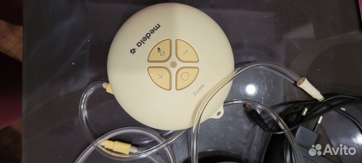 Молокоотсос medela электрический