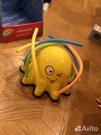 Игрушка осьминог, поливалка