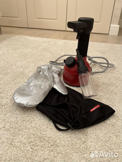 Отпариватель для одежды Laurastar