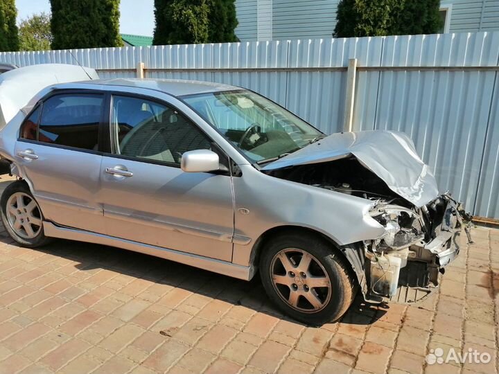 Разбор Мицубиси Лансер 9