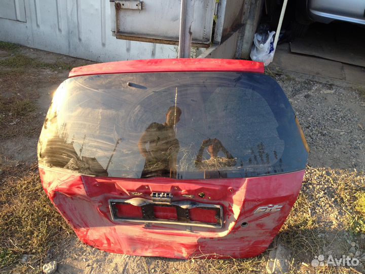 Крышка багажника от Honda Fit