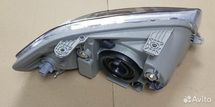 Фара передняя левая (с корр) T-250