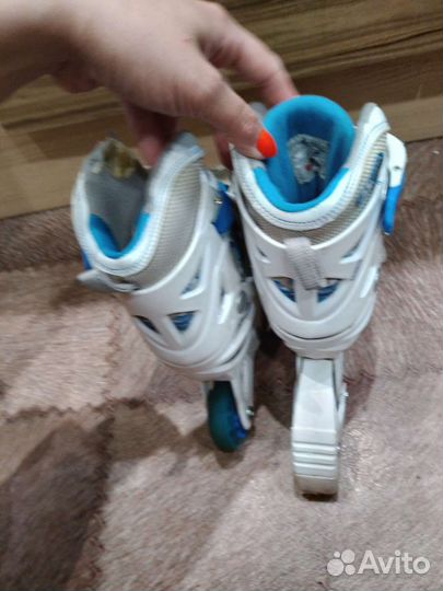 Роликовые коньки