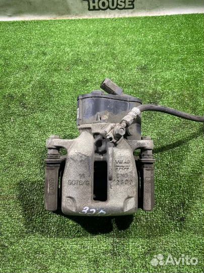 Суппорт задний левый Volkswagen Passat B6 CDA 2010