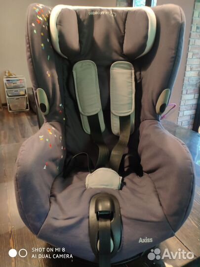 Axiss bebeconfort поворотное автокресло 9-18 кг