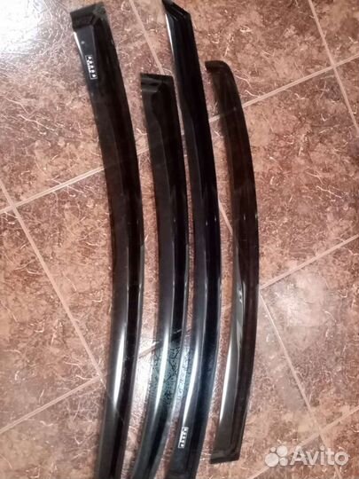 Тойота. Дефлекторы окон и капота (мухобойка)