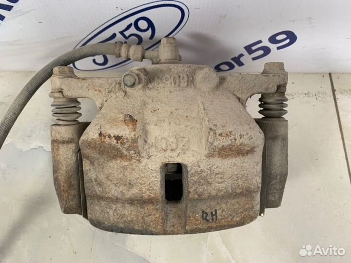 Суппорт передний правый Nissan X-Trail T31 2.0