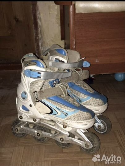 Роликовые коньки