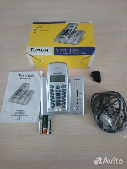 Телефон Topcom