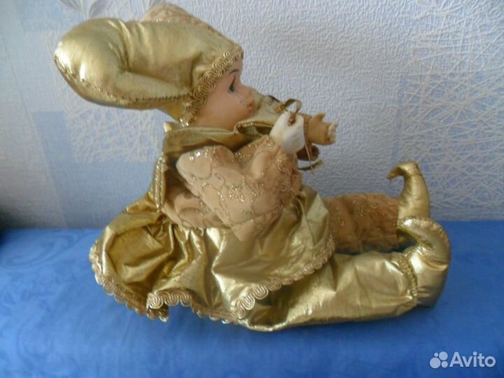 Музыкальный заводной клоун. 28 см. Красивый