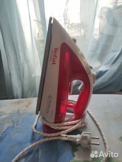 Гладильная доска и утюг