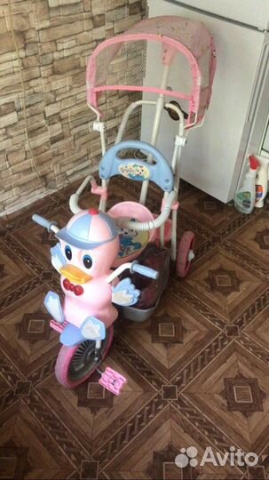 Трехколесный велосипед с ручкой