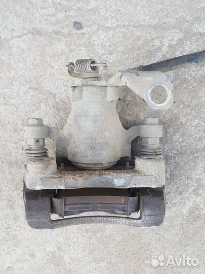 Суппорт задний левый 583101Y300 KIA picanto 2008