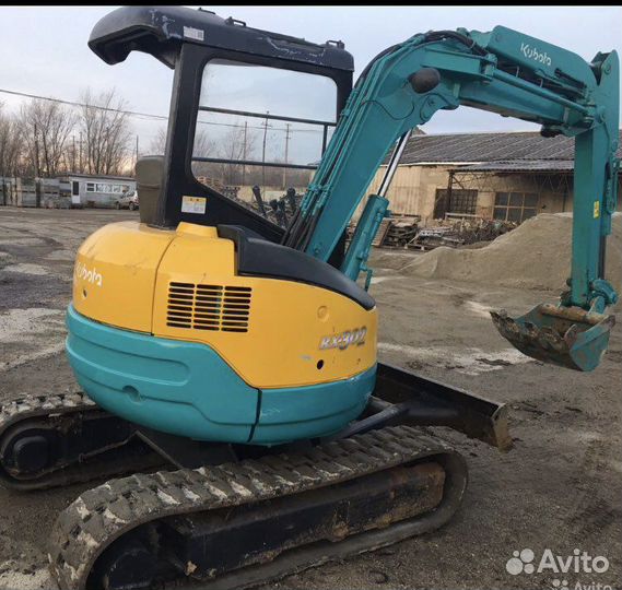 Рытье ям траншей мини экскаватором