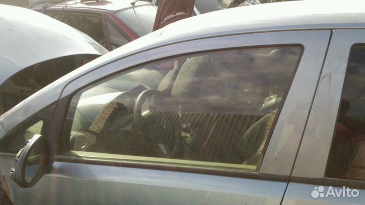 Стекло водительское Opel Corsa D Опель Корса Д 1,4