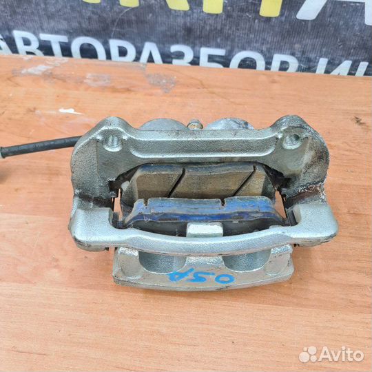 Суппорт тормозной передний правый Kia Mohave 1