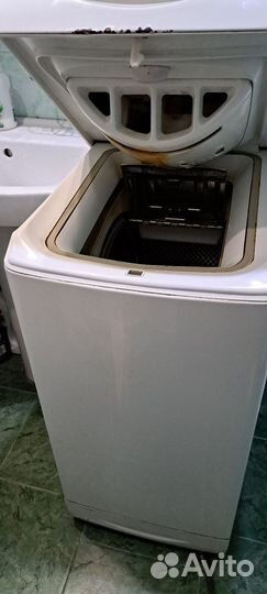 Стиральная машина с вертикальной загрузкой